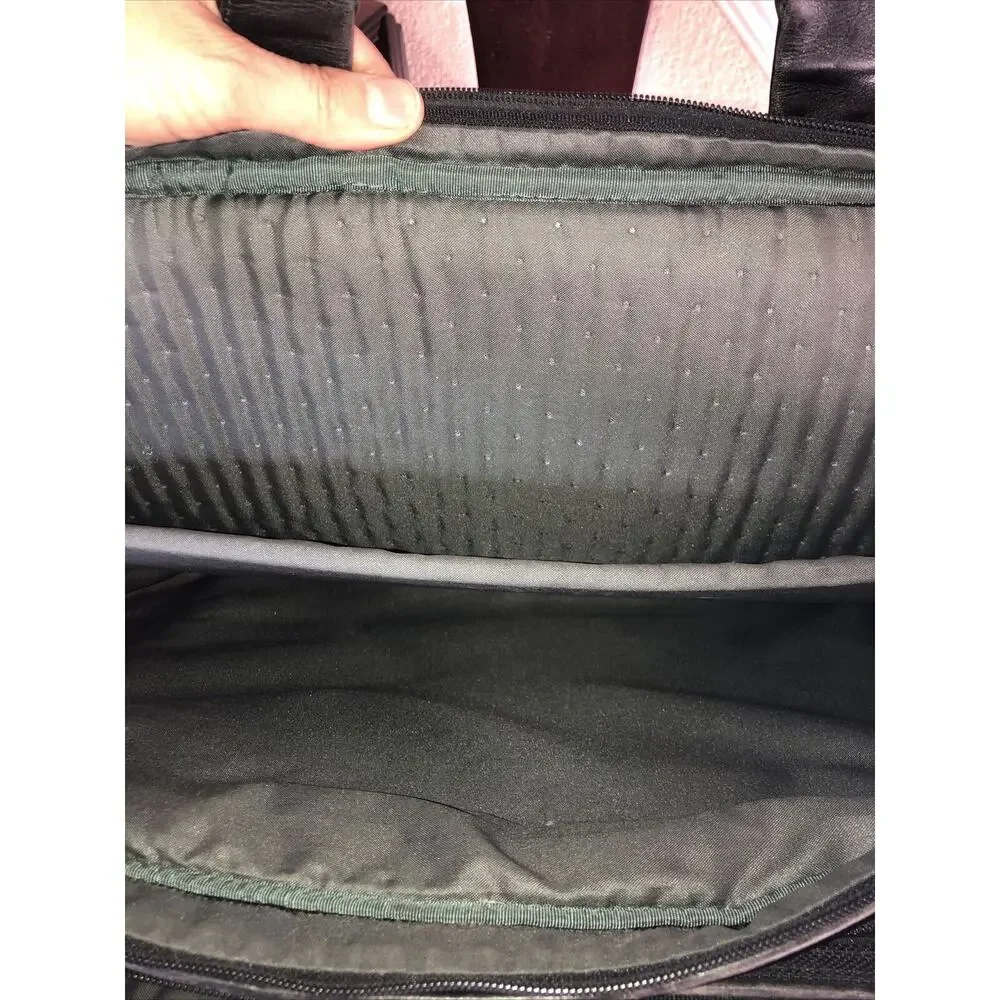 Tumi expandable leather